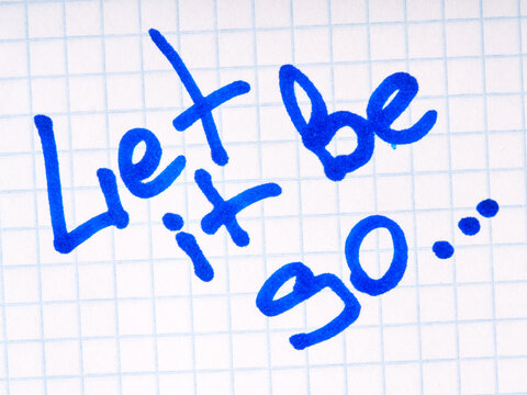 Let it be so. Closeup is written with a marker on the notebook sheet