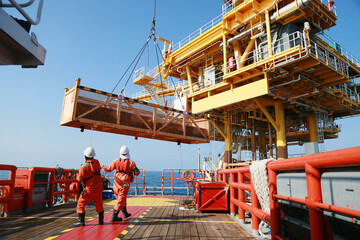 Crews boat moving the passenger and cargo from the platform to supply boat in oil and gas industry....