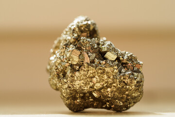 Tiny pyrite crystals on a mound.