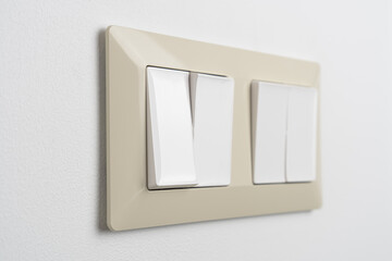 Light switch with four buttons on white wall. Power, electricity, environmental conservation, energy saving concept.