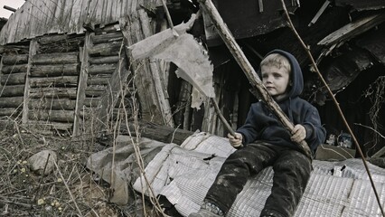 A child is crying^ playing in the ruins