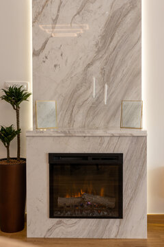 Marble fireplace in luxury apartment
