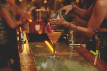 Female barman preparing drinks. cocktail bar Drinks at the bar. Fresh and cold drinks in a bar. Watermelon drink, jamiaca drink, margarita, micheladas.