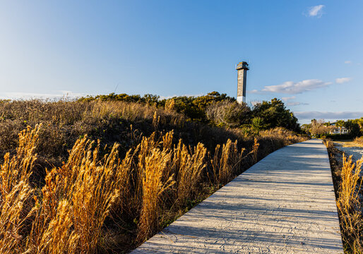 The Sand Dunes of Station 18 Beach and Sullivan's Island Lighthouse, Sullivan's Island, South Carolina, USA
