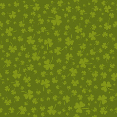 shamrocks on olive green repetitive background. saint patricks day. festive illustration. vector seamless pattern. fabric swatch. wrapping paper. continuous design template for textile, home decor