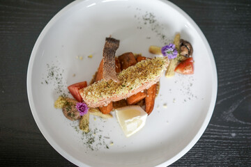 Herb Crusted Salmon. Grilled salmon steak with lemon mushroom and potatoes