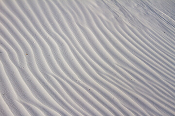 ripples in the white sand