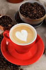 latte or Cappuccino with frothy foam, coffee cup top view on table in cafe.