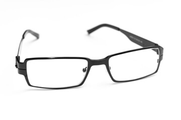 glasses for vision correction in black frame on a white background. advertising of the optics store and ophthalmologist services. fashion accessory.