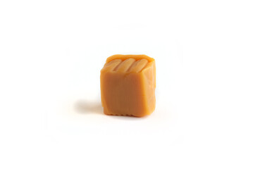 Unwrapped Caramel Candy Square Cube Isolated on White