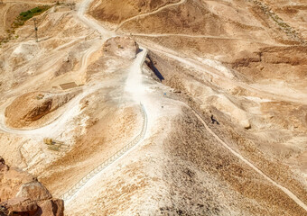 Remains of ancient Roman military ramp located in desert at Masada National Park in Israel. 