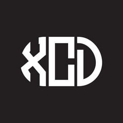Fototapeta premium XCD letter logo design. XCD monogram initials letter logo concept. XCD letter design in black background.