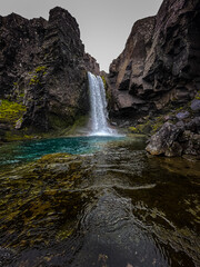 Beautiful aerial view of the magnificent Folaldafoss waterfall in the highlands of Iceland