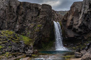 Beautiful aerial view of the magnificent Folaldafoss waterfall in the highlands of Iceland
