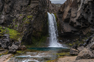 Beautiful aerial view of the magnificent Folaldafoss waterfall in the highlands of Iceland
