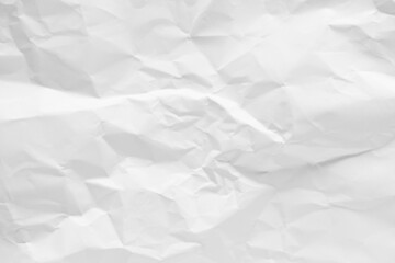 White crumpled paper texture background.