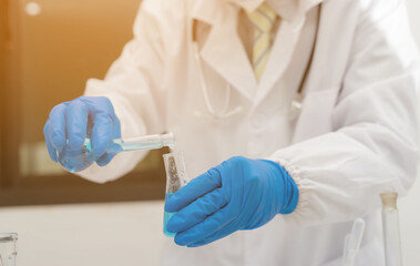 Professional doctors perform find virus tests from samples of blood tests to diagnose coronary...