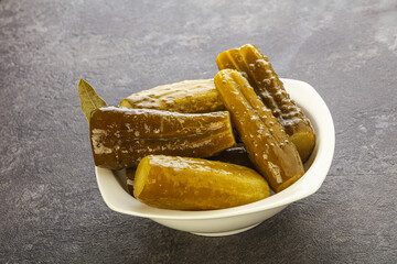 Marinated pickled cucumbers in the bowl