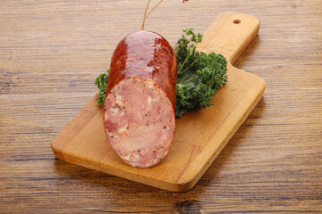 Pork ham sausage over board