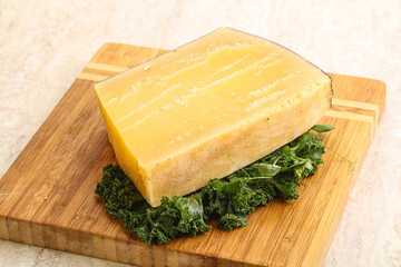 Parmesan cheese piece over board