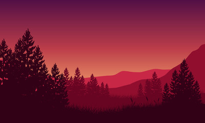 Aesthetic panoramic views of mountains with big trees from out of the city at sunset