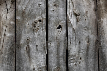 A close-up of old and weathered wooden planks
