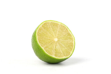 A close-up of half a lime isolated on white
