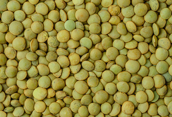 Green lentils background. Top view, overhead