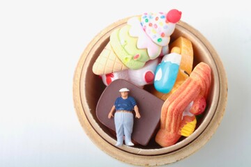 miniature figurine of a man with food
