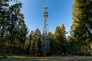 Obraz premium Iron lookout tower on the hill near the village Drmoul - Czech Republic, Europe