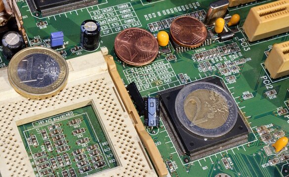 euro coins and electronic circuit board background