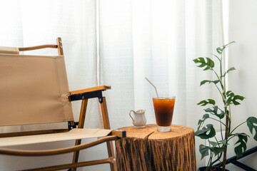 iced black coffee in a cup in the room