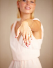 I said yes. Cropped shot of a young woman displaying her engagement ring.