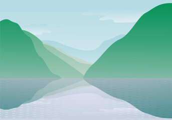 View of the mountains reflected in the lake