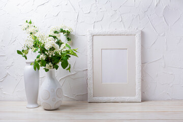 White frame mockup with viburnum flowers in the vase