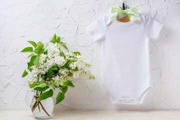 White baby short sleeve bodysuit mockup with white lilac