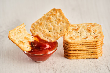Salted  biscuits and salsa sauce