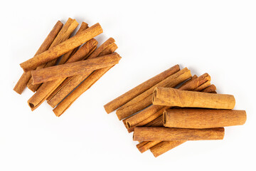 stick of cinnamon on a white background