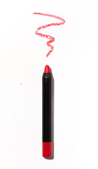 Red matte lipstick in the form of a pencil, smear texture on a white background