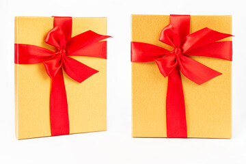 gift wrapping on a white background with red ribbons
