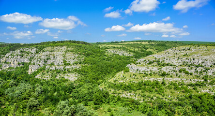 Green mountains and blue sky landscape