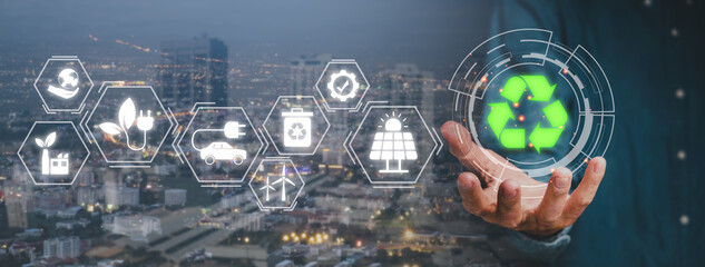 ESG concept of environmental, Green ethical business preserving resources, reducing CO2, caring for employees. Person hand holding with VR screen ESG icon....