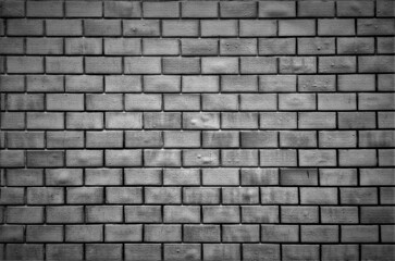Fototapeta na wymiar black brick wall texture, seamless background