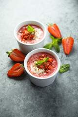 Homemade strawberry soup with chocolate and cream