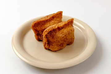 Tofu sushi on a white background