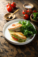 Chicken stuffed with pesto, tomato and cheese