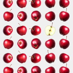 Pattern from red fresh apples isolated on light gray background. Whole ripe apples. Sweet summer fruit, organic natural apple. Apple set for design and advertising. Concept of food and harvest