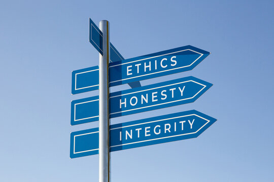 Naklejki Ethics honesty integrity words on signpost isolated on sky background
