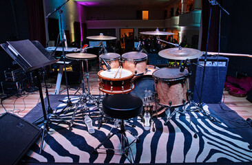 Fototapeta na wymiar Musical instruments concept. Close up of drum set on a stage.
