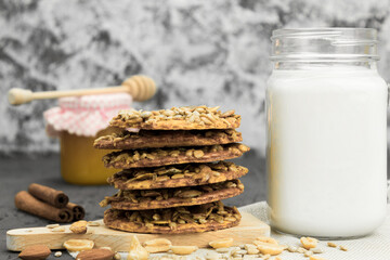 Fototapeta na wymiar Fresh cookies with milk on a wooden table